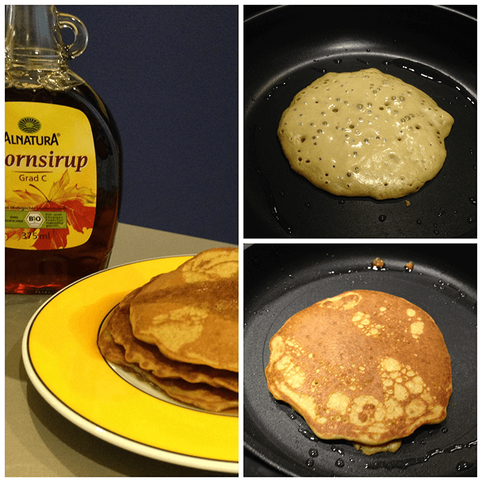 Glutenfreie Pancakes in der Pfanne und auf dem Teller mit Ahornsirup im Hintergrund